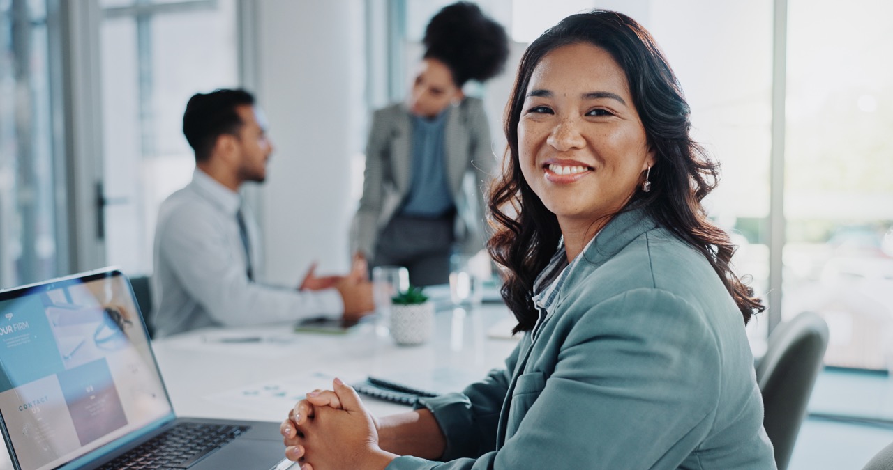 Woman office employee smiling at camera